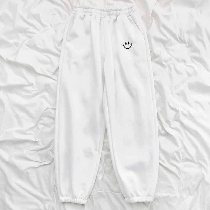 Pantalon de jogging ample à smiley appliqué