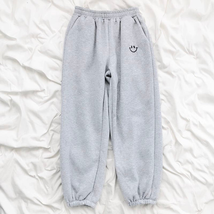 Pantalon de jogging ample à smiley appliqué