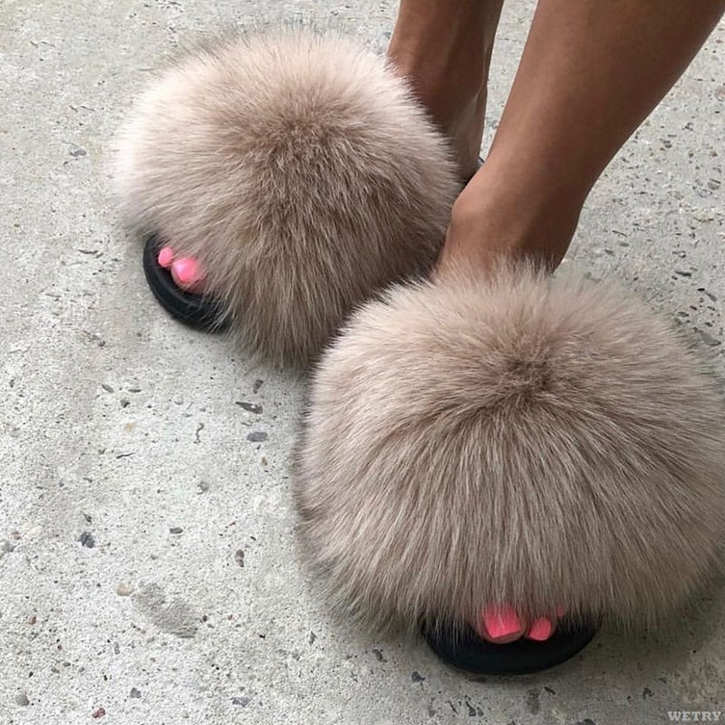 Chaussons femme à fausse fourrure longue