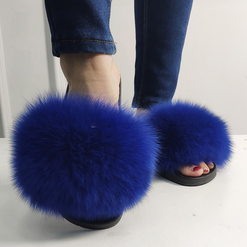 Chaussons femme à fausse fourrure longue