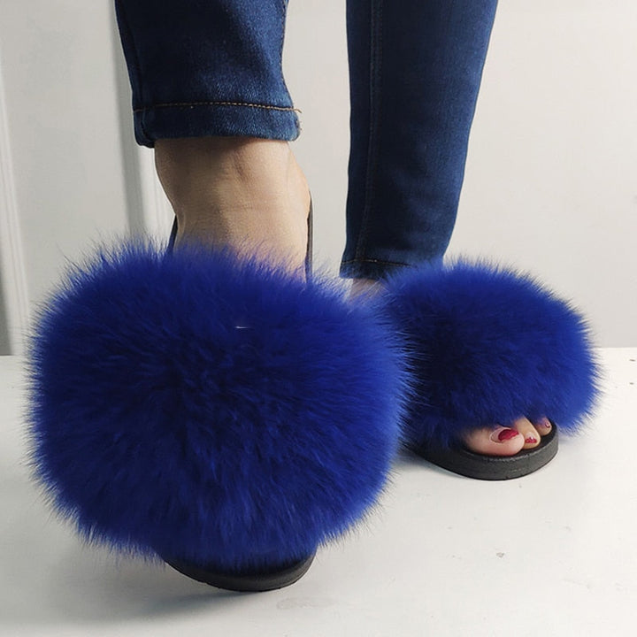 Chaussons femme à fausse fourrure longue
