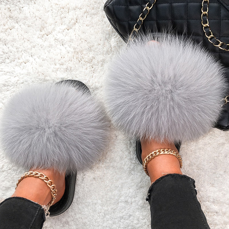 Chaussons femme à fausse fourrure longue