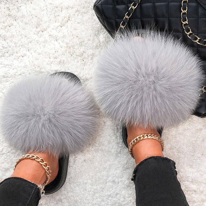 Chaussons femme à fausse fourrure longue