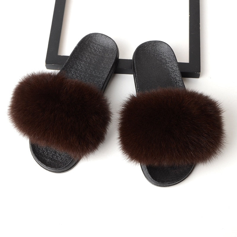 Chaussons femme à fausse fourrure longue