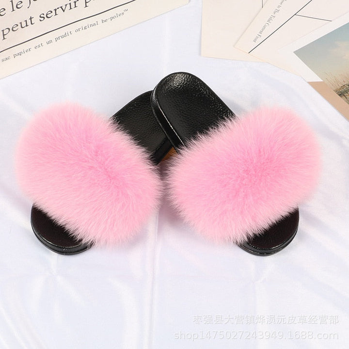 Chaussons femme à fausse fourrure longue
