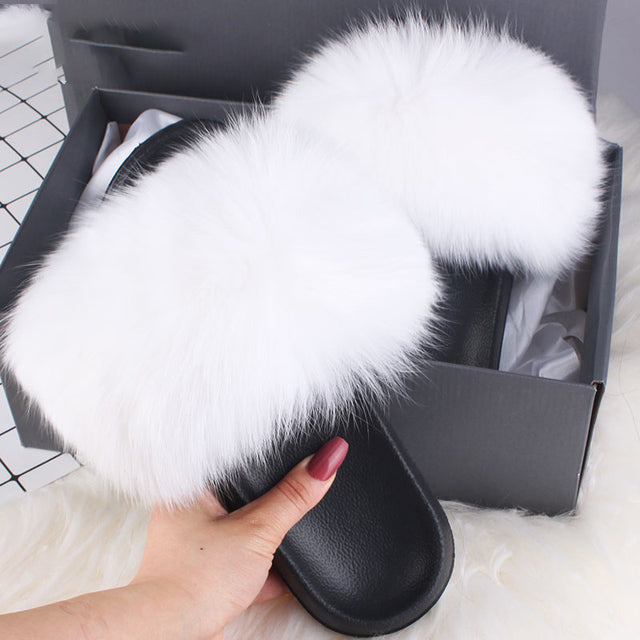 Chaussons femme à fausse fourrure longue