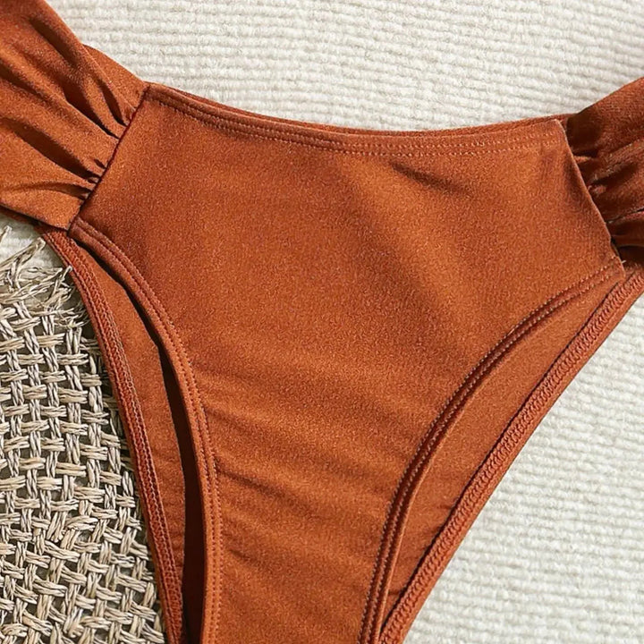 Bikini taille haute avec coquillage métallique